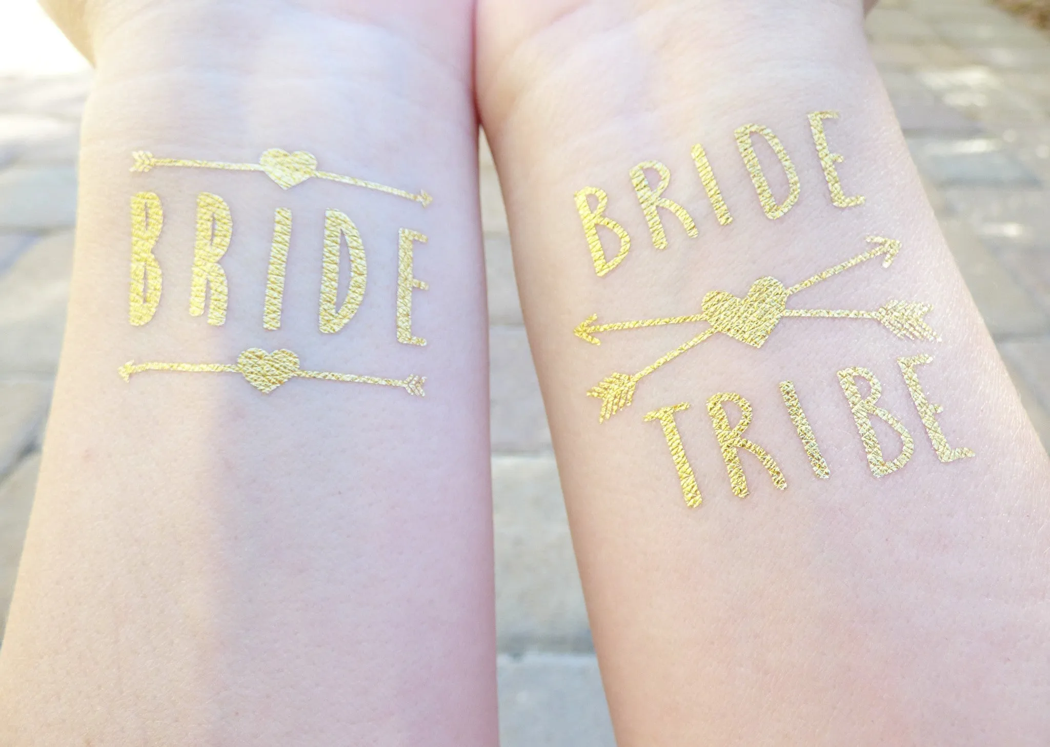 Bride Tattoo With Arrows and Hearts
