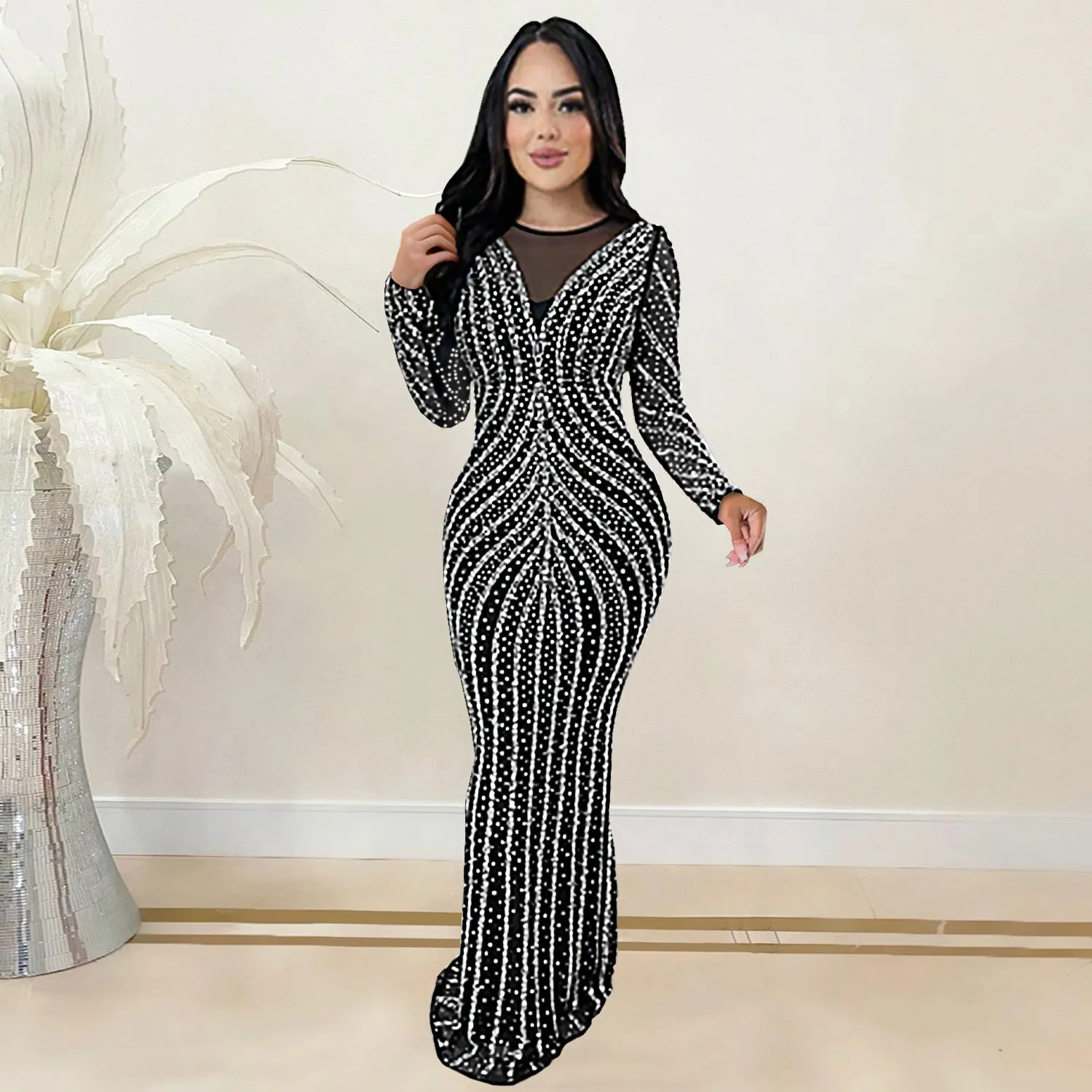 Glamorous Beaded Mesh Long Sleeve Evening Gown with Curve-Enhancing Design