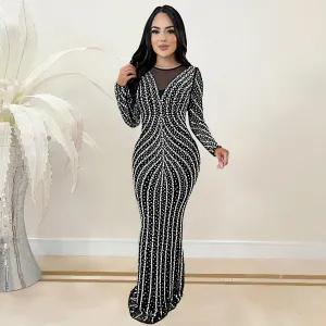 Glamorous Beaded Mesh Long Sleeve Evening Gown with Curve-Enhancing Design