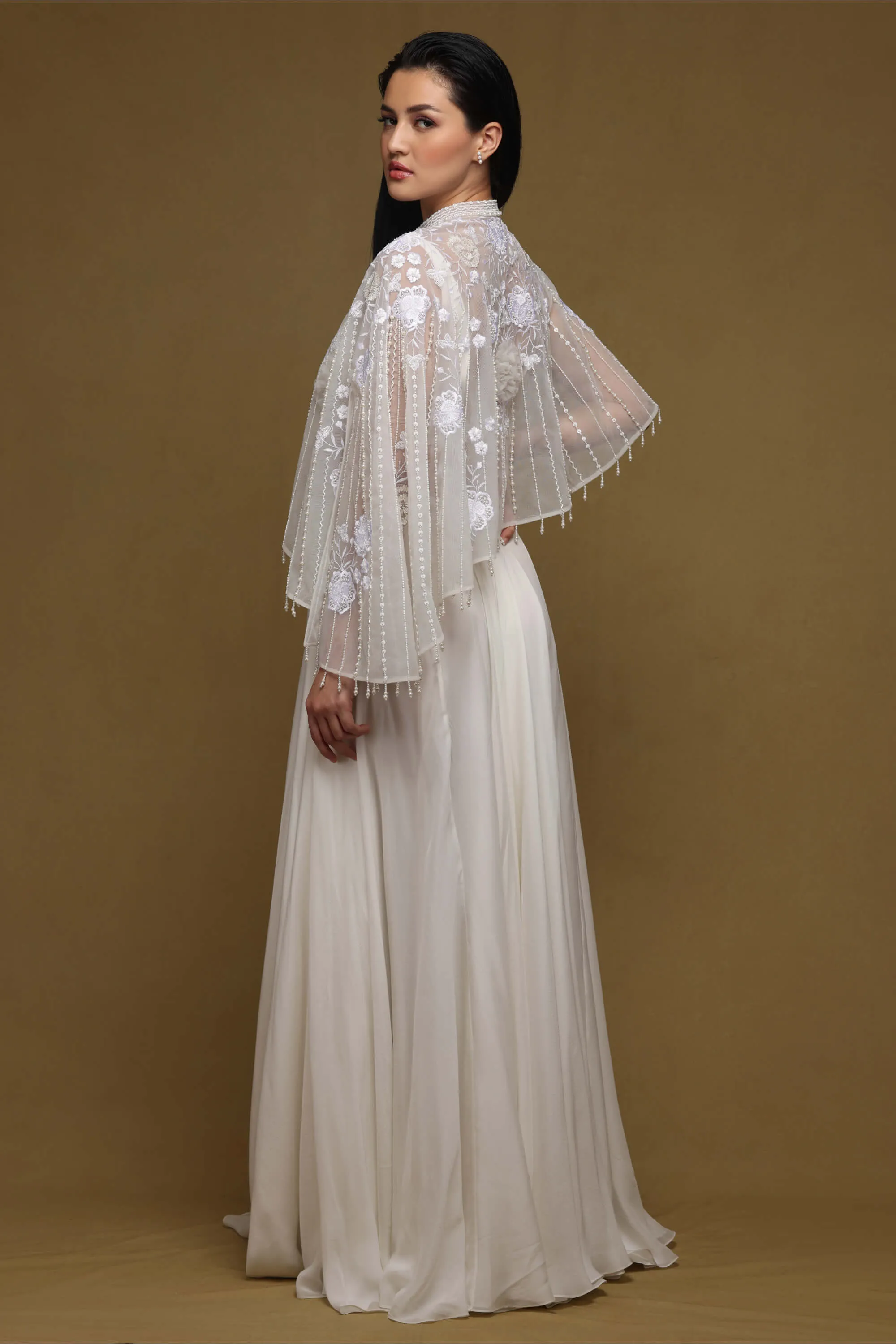 Ivory asymmetric cape and skirt set