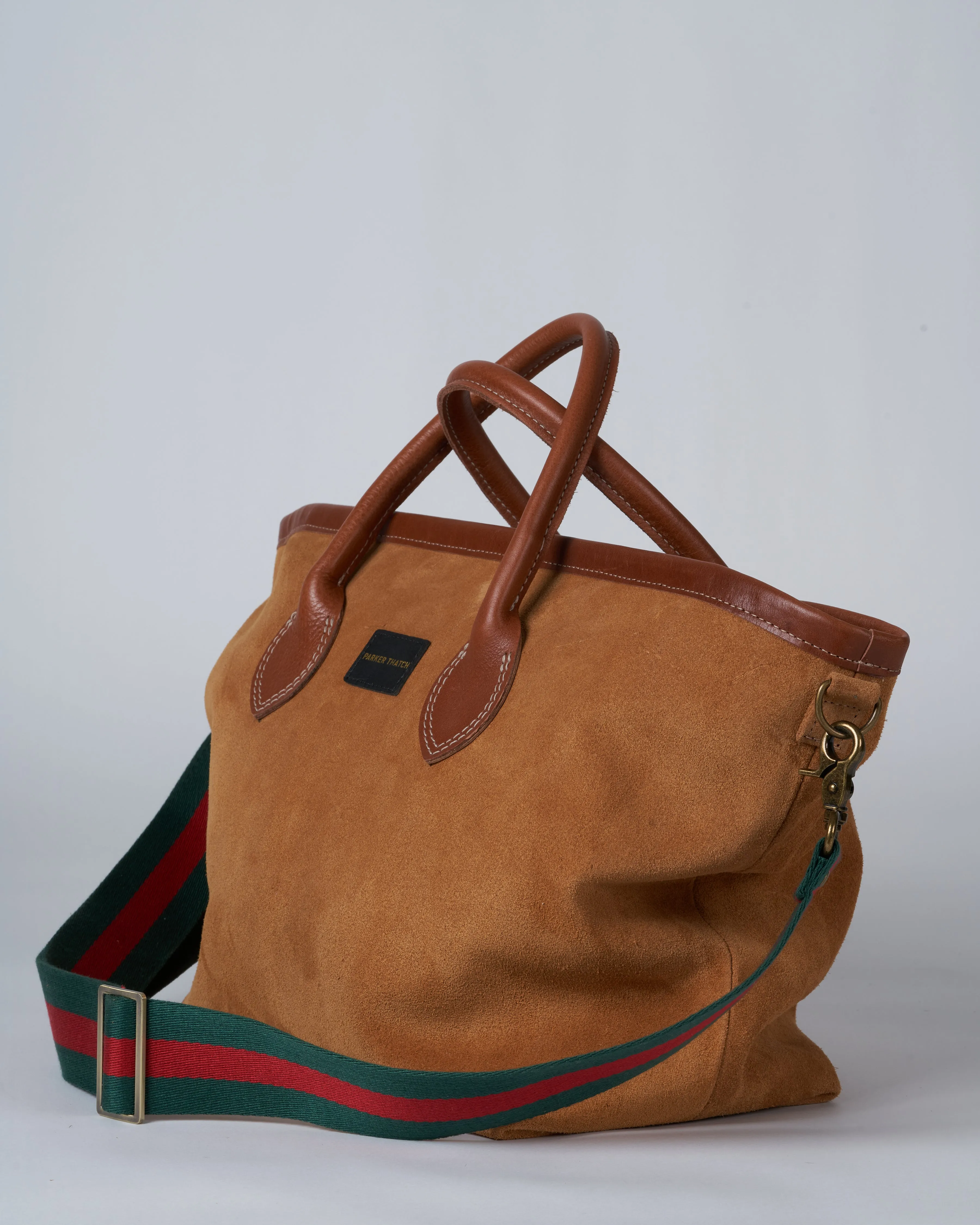 lil easy saddle bag - caramel with green and red web straps